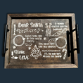 Load image into Gallery viewer, The Cookies for Santa Serving Tray is a wooden tray with charming chalk-like drawings and festive text for Santa. Ideal for Christmas Eve, it holds milk, a carrot for the reindeer, and treats. Featuring a tree and ornaments, its signed Love, Levi, adding charm to your holiday celebrations.