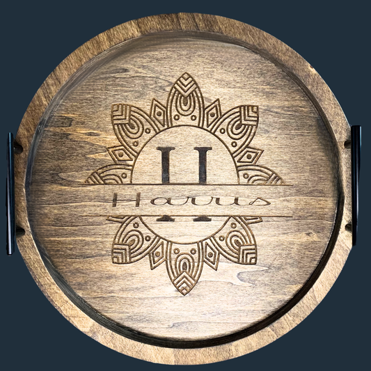 Elegant wooden serving tray with a smooth finish, featuring rounded edges and sturdy handles for easy transport. The tray is set against a soft, blue background, showcasing its natural grain and rich color. Ideal for serving drinks, snacks, or breakfast in bed.